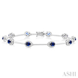 4x3 MM Oval Cut Sapphire and 1/2 ctw Round Cut Diamond Halo Precious Bar Link Bracelet in 10K White Gold