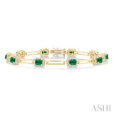 4x3 MM Emerald and 5/8 Ctw Round Cut Diamond Halo Precious Open Link Bracelet in 14K Yellow Gold