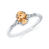 10KT.09CT(8)DIA/7X5OV CITRINE LDS RG