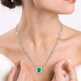 6x4 MM Oval Cut Emerald and 1/6 Ctw Round Cut Diamond Necklace in 14K White Gold