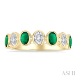 4X3 MM Oval Shape Emerald and 1/2 Ctw Oval Cut Diamond 7 Stone Bezel Set Precious Fashion Band in 14K Yellow Gold