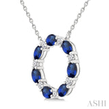 4x3 MM Oval Cut Sapphire and 1/4 Ctw Round Cut Diamond Circle Pendant With Chain in 14K White Gold