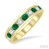 2.9 MM Emerald and 1/2 Ctw Round Cut Diamond Precious Wedding Band in 14K Yellow Gold