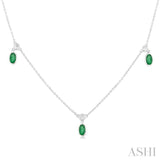 5x3 MM Oval Shape Emerald and 1/4 Ctw Round Cut Diamonds Precious Station Necklace in 14K White Gold
