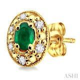 4x3 MM Oval Shaped Emerald and 1/10 ctw Single Cut Diamond Earrings in 14K Yellow Gold
