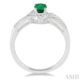 6x4 MM Oval Cut Emerald and 1/6 ctw Round Cut Diamond Ring in 10K White Gold