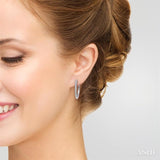 1/4 ctw Round Cut Diamond Hoop Earrings in 10K White Gold