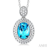 8X6 MM Oval Cut Blue Topaz and 1/20 Ctw Round Cut Diamond Semi-Precious Pendant With Chain in Sterling Silver