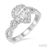1/2 ctw Twisted Shank Pear Shape Semi-Mount Round Cut & Baguette Diamond Engagement Ring in 14K White Gold