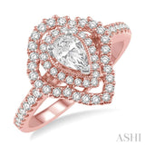3/4 ctw Pear Shape Center Semi-Mount Round Cut Diamond Engagement Ring in 14K Rose and White Gold