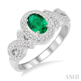 6x4 MM Oval Cut Emerald and 1/4 Ctw Round Cut Diamond Ring in 10K White Gold