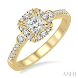 1/2 Ctw Diamond Engagement Ring with 1/5 Ct Princess Cut Center Stone in 14K Yellow Gold