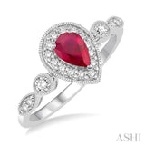 6X4MM Pear shape Ruby Center and 1/4 Ctw Round Cut Diamond Ring in 14K White Gold